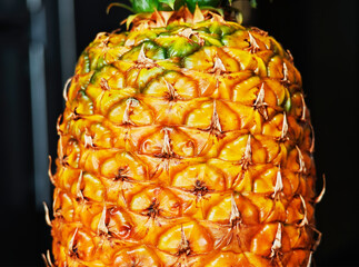 Juicy pineapple on the kitchen table backdrop