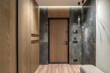 long empty corridor in interior of entrance hall of modern apartments, office or clinic