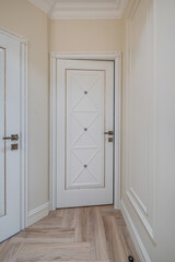 long empty corridor in interior of entrance hall of modern apartments, office or clinic