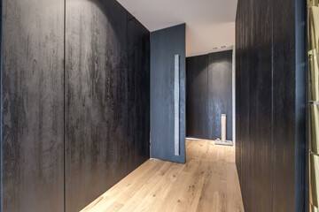 long empty corridor in interior of entrance hall of modern apartments, office or clinic