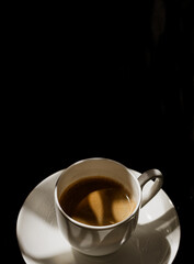minimalist still life of a white porcelain espresso cup