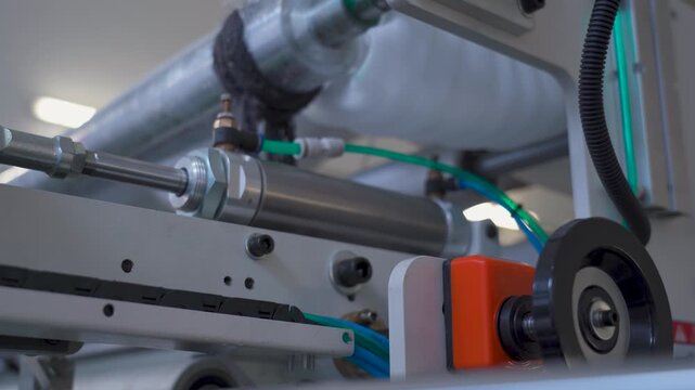 Pneumatic cylinder actuator working on industrial machinery