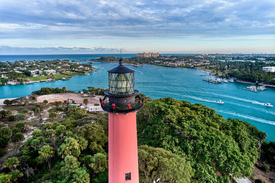 Aerial image of the Jupiter Island Lighthouse in Florida located at the confluence of the Indian and Loxahatchee rivers, and the inlet from the Atlantic Ocean