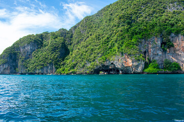 Phi Phi Islands Near Phuket Thailand. Beautiful landscape Limestone rock formations on Andaman Sea, Turquoise clear blue and green water
