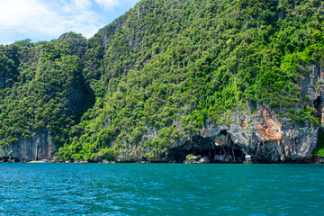 Phi Phi Islands Near Phuket Thailand. Beautiful landscape Limestone rock formations on Andaman Sea, Turquoise clear blue and green water