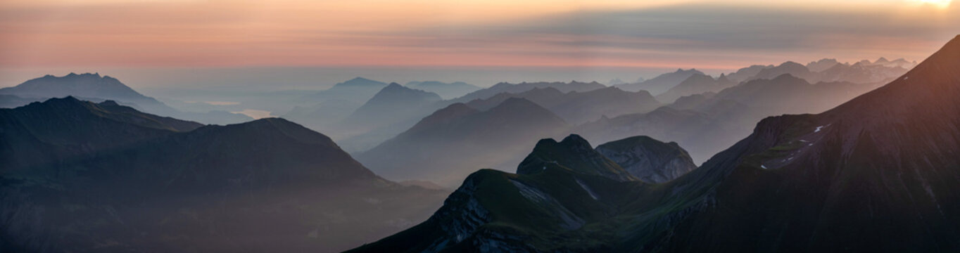 Sunset over the Bernese alps with mountains Wildgaerst and Schwarzhorn in the foreground