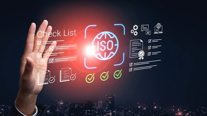Hand Holding Digital Checklist Icon Representing ISO Standards and Quality Management in Business...