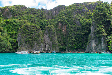 Phi Phi Islands Near Phuket Thailand. Beautiful landscape Limestone rock formations on Andaman Sea, Turquoise clear blue and green water