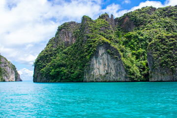 Phi Phi Islands Near Phuket Thailand. Beautiful landscape Limestone rock formations on Andaman Sea, Turquoise clear blue and green water