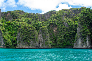 Phi Phi Islands Near Phuket Thailand. Beautiful landscape Limestone rock formations on Andaman Sea, Turquoise clear blue and green water
