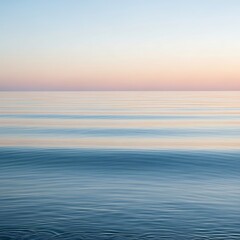 Obraz premium Harmonious blend of pastel sky and still ocean waters at twilight time