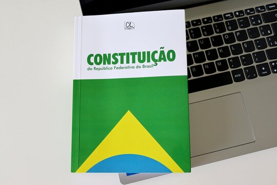 Salvador, Brazil - February 15, 2026: Book of the Constitui&ccedil;&atilde;o da Rep&uacute;blica Federativa do Brasil (Constitution of the Federative Republic of Brazil). Concept of Brazilian law, democracy and justice.