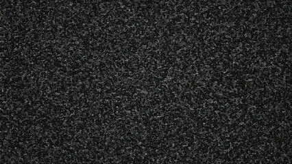 Fototapeta premium Black asphalt grainy texture background.
