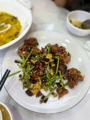 Stir Fried Sichuan Chicken on a Plate
