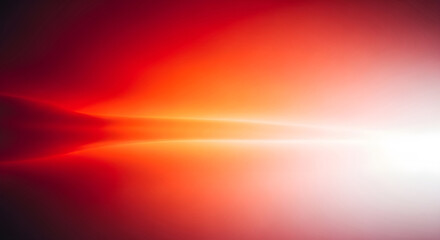 Obraz premium Abstract red and orange light streak background with bright horizon glow