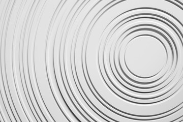 Obraz premium image is white circle with gray background. circle is surrounded by series of smaller circles, creating sense of depth and movement