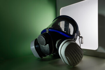 Exterminator&rsquo;s face mask with its filters, set in a colorful environment with colored lighting.