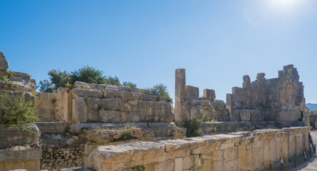 Fototapeta premium Ancient Ruins of a Stone Amphitheater in Demre, Turkey, Under a Clear Sky