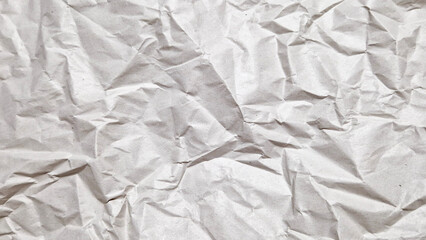 Obraz premium Top view of wrinkled paper surface for mockup and design background