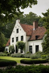 Obraz premium Charming white house located in a green garden surrounded by trees, with a red roof and well-kept bushes, inviting visitors to enjoy the outdoor setting on a cloudy day