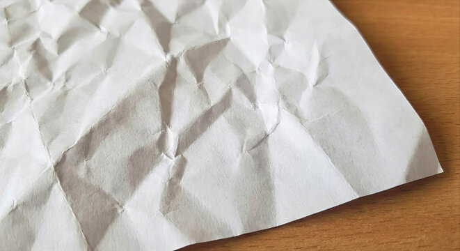 Texture of crumped white paper for background with copyspace