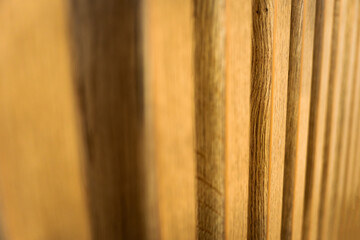 Wooden slats texture background with beautiful depth of field focused on the slats