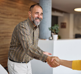 Group of  businesspeople having a meeting shaking hands handshake introducing each other and...