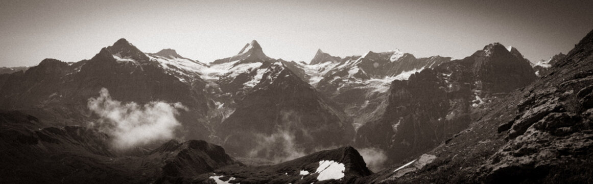Panoramic view on the iconic Swiss mountains Wetterhorn, Schreckhorn, Eiger, Moench and Jungfrau in the Bernese Highland