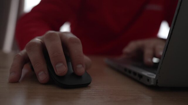 Male Hand Clicking Mouse Close Up