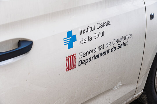 Institut catal&agrave; de la salut logo on white medical vehicle door