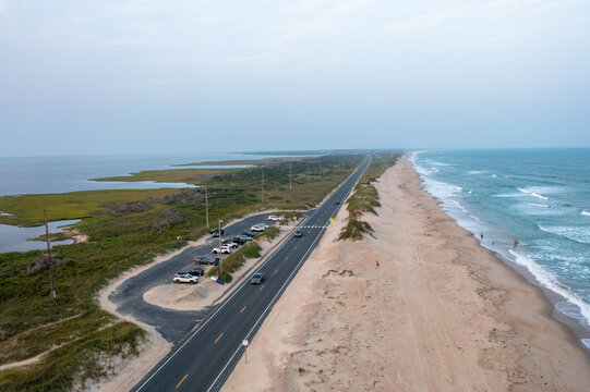 Aerial View of Cars Driving Down Highway 12 on Hatteras Island in the Outer Banks North Carolina