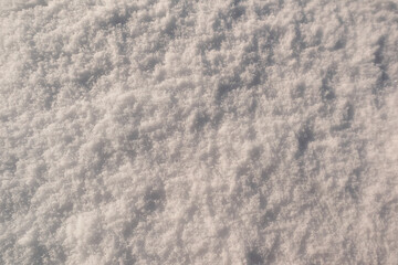 Obraz premium Sparkling hoarfrost and ice crystals on fresh snow in bright winter sunlight.