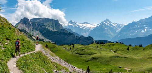 Schynige Platte, Switzerland - August 13, 2025 - Hikers at the Schynige Platte in the Bernese highland © imagoDens