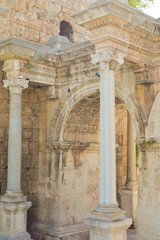 Fototapeta premium Detail of historic Hadrian's Gate in old city of Antalya, Turkey.