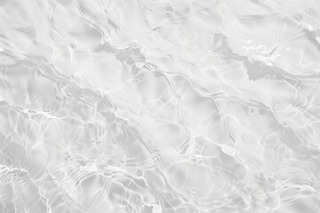 The image is of a body of water with ripples and waves. The water appears to be calm and serene, with no visible movement or disturbance. Scene is peaceful and tranquil