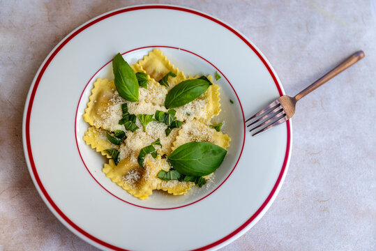 Ravioli with parmesan and basil .Cacio e pepe pasta