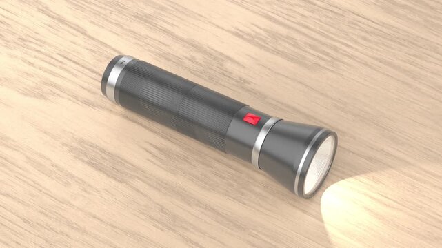 LED flashlight on wooden desk
