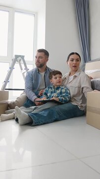 Happy family planning home renovation in new apartment