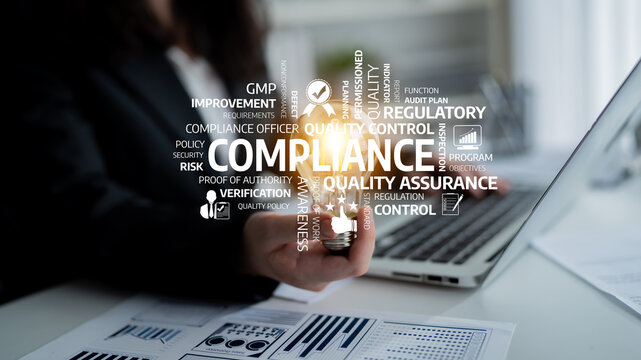 This stock photo captures a business professional engaged in compliance and quality assurance efforts, featuring charts and keywords related to regulatory standards and risk management. Tessel