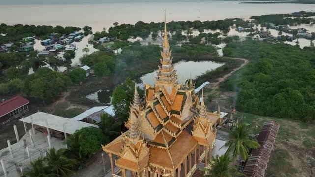 Sacred temple and floating fishing village Tonle Sap