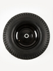 Wheel is pneumatic on a white background. Black rubber and disc.