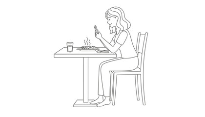 Fototapeta premium Woman sitting alone at a table using her mobile phone while eating.