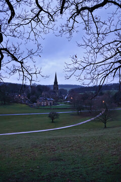 The beautiful village of Edensor, Derbyshire; traditional stone buildings and gothic revival parish church within Chatsworth Estate in the Peak District National Park near Chatsworth House, England