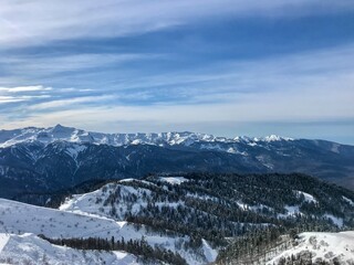Obraz premium Winter landscape with mountains an blue sky