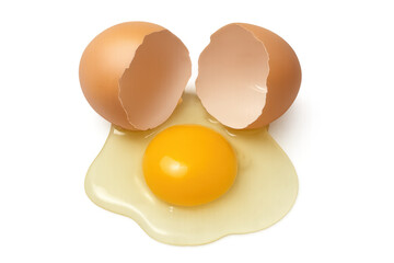 Cracked raw egg with yolk and white spilling