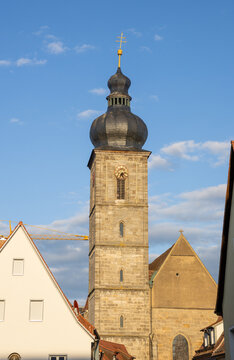St. Martin Church in Forchheim, Bavaria, Germany, historic Catholic church next to the timber-framed houses (Fachwerkh&auml;user) along the main street, UNESCO-style old town charm.
