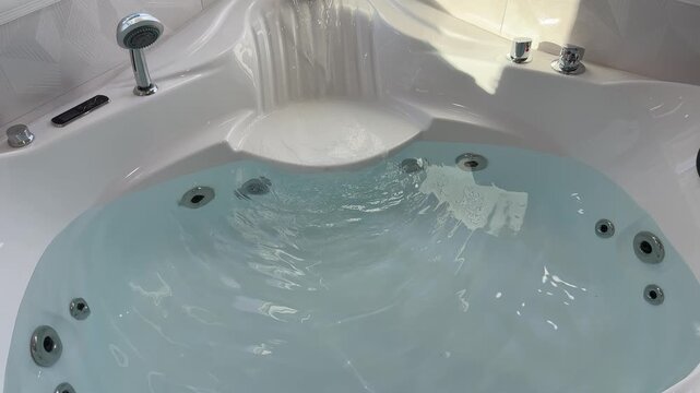 Video of a residential home hot tub jacuzzi running water in bathroom 