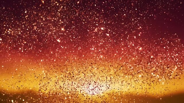 Glittering particles cascade in a fiery sunset gradient