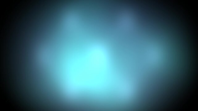Abstract blue light swirls into circular shape on black background