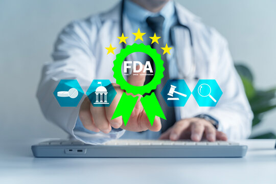 Doctor pointing to FDA approval badge for pharmaceutical regulation and compliance